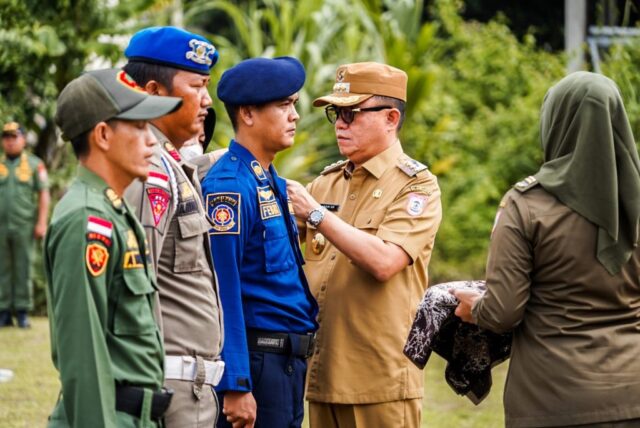 Jelang Pemilu Serentak 2024, Pj Bupati Hani Syopiar Rustam Pimpin Apel Gelar Pasukan