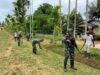 Satgas Pamtas Yonif 144/JY sebagai Pelopor Karya Bhakti Bersihkan jalan perlintasan kampung Assikie